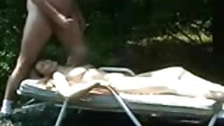 Jerk off and cuming on sunbathing woman