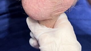 trying to milk cum to my lover in latex gloves