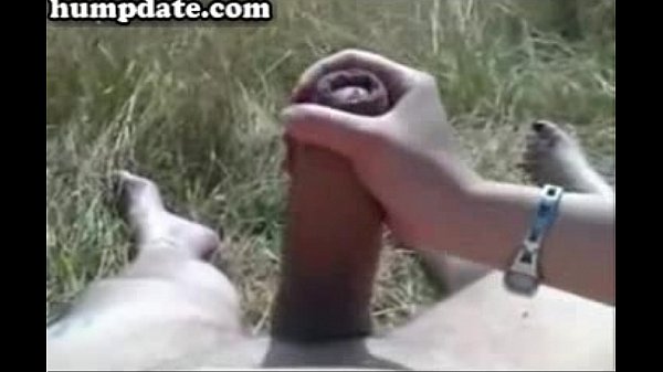 Lucky guy with huge cock gets outdoor handjob